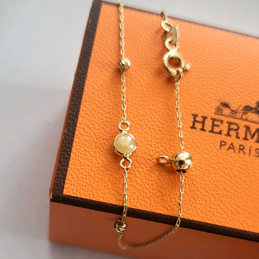Pre-owned 14k gold bracelet with yellow stones
