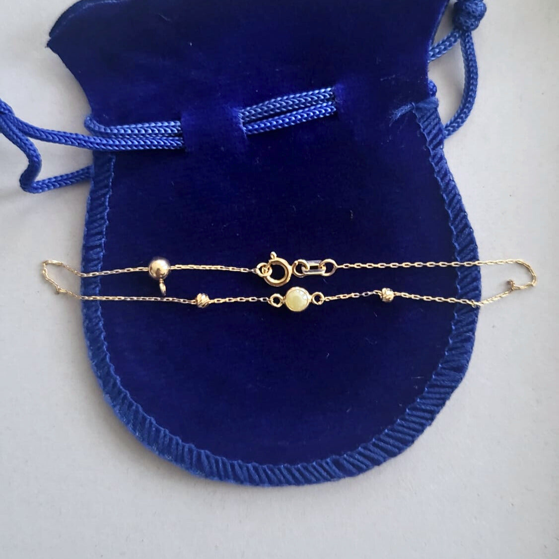 Pre-owned 14k gold bracelet with yellow stones