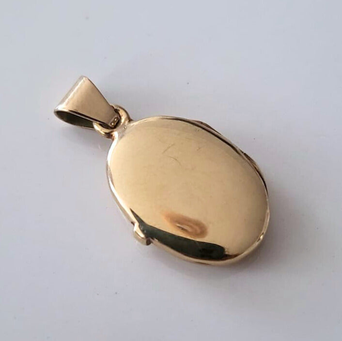 Vintage 14k gouden medaillon met bloemen