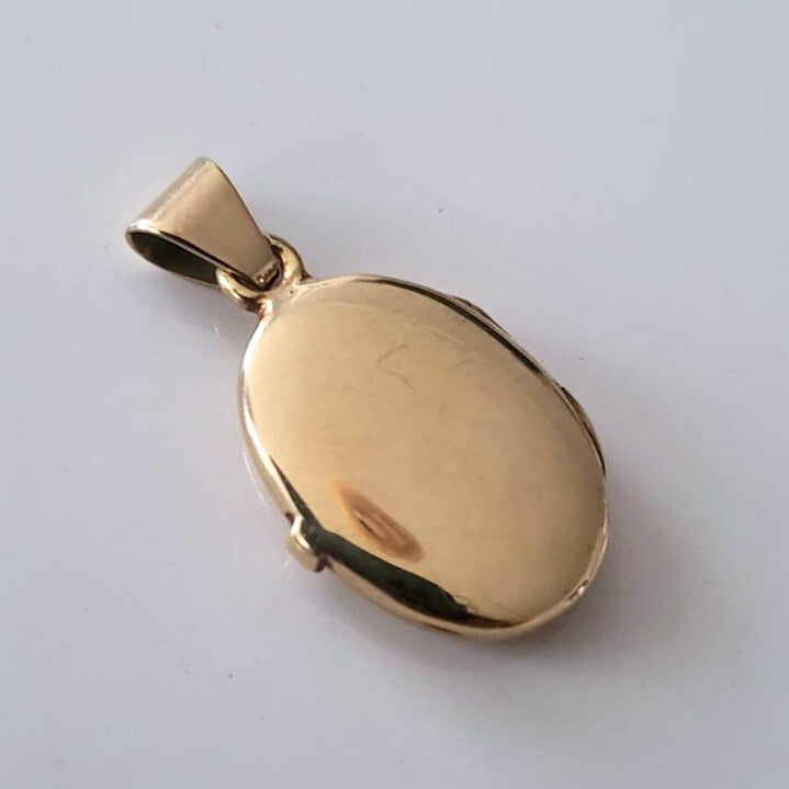 Vintage 14k gouden medaillon met bloemen