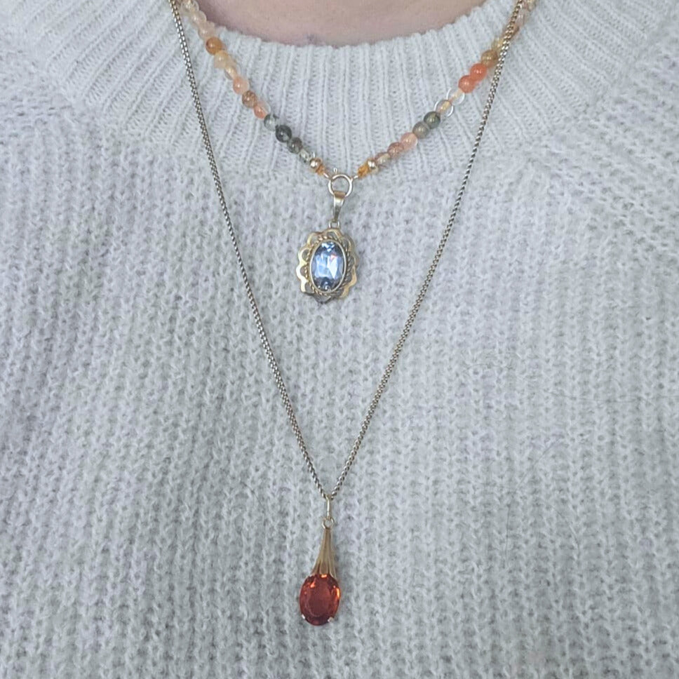 Vintage 14k gold pendant with orange stone