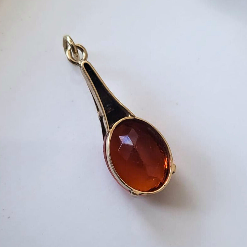 Vintage 14k gold pendant with orange stone