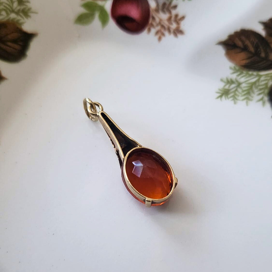 Vintage 14k gold pendant with orange stone