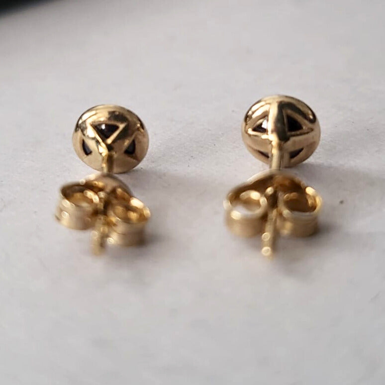 Pre-owned 14k gold earrings with purple stones