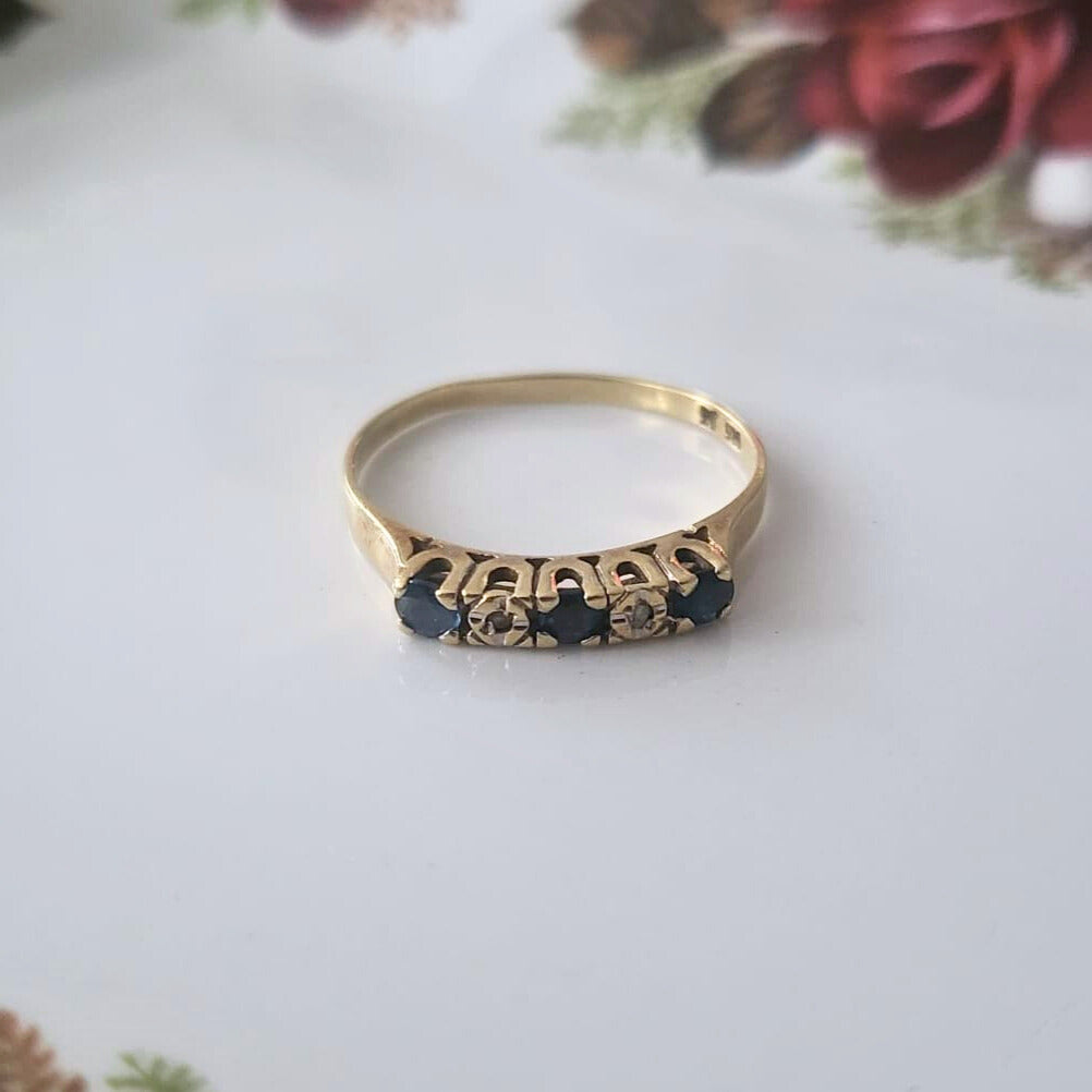 Vintage 14k gold ring with sapphire and diamonds