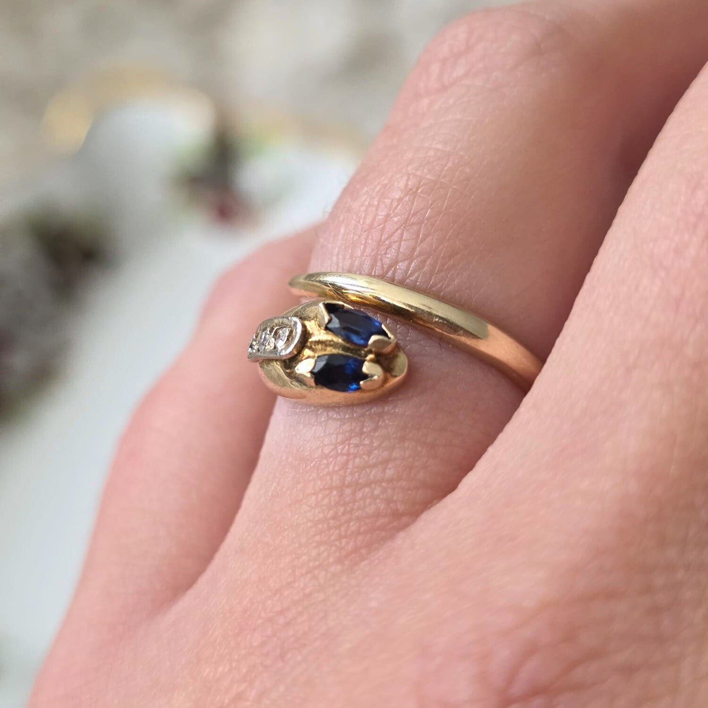 Vintage 14k gouden slang ring met saffier en diamant