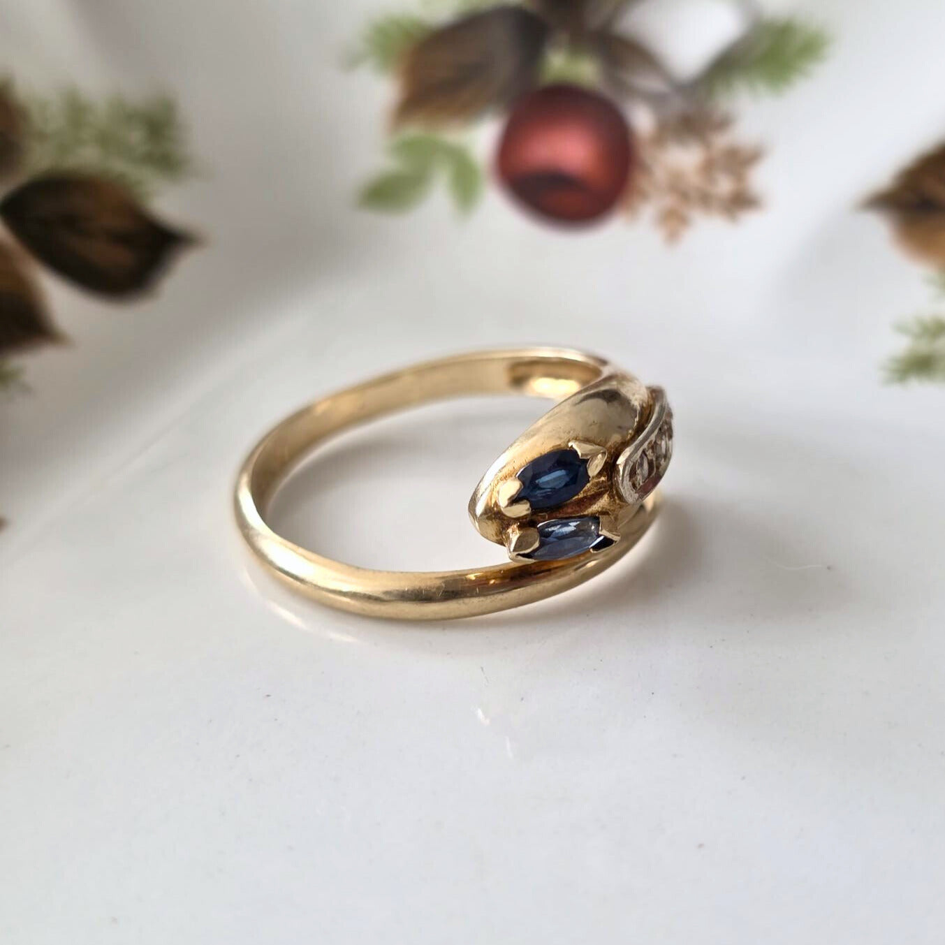 Vintage 14k gouden slang ring met saffier en diamant