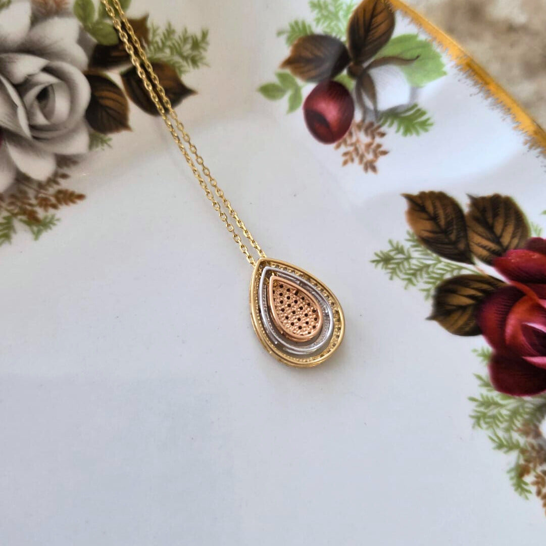 Pre-owned 14k gouden ketting met tri-color hanger