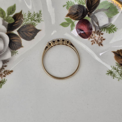 Vintage 14k gold ring with a row of diamonds