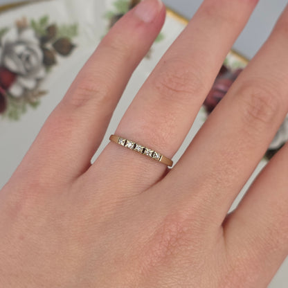 Vintage 14k gold ring with a row of diamonds