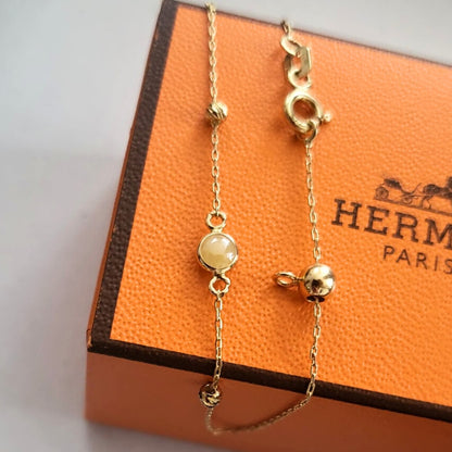 Pre-owned 14k gouden armband geel steentje