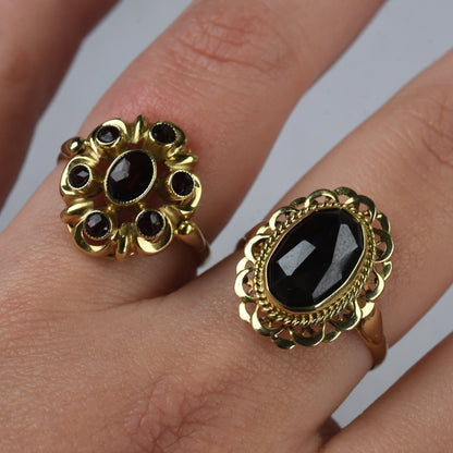 Vintage 14k gouden ring met granaat entourage