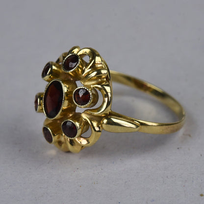 Vintage 14k gouden ring met granaat entourage