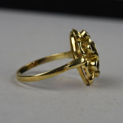 Vintage 14k gouden ring met granaat entourage