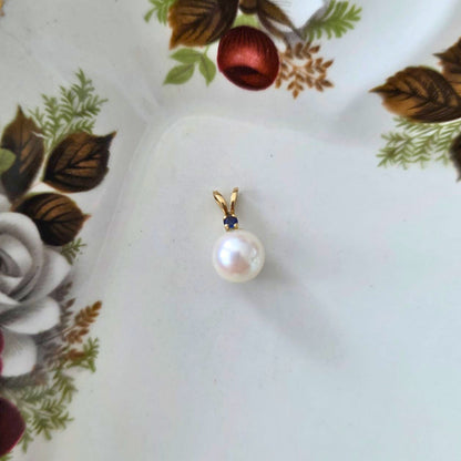 Vintage 14k gold pendant with pearl and sapphire