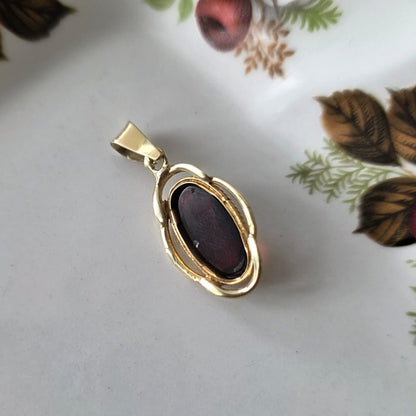 Vintage 14k gouden hanger met granaat