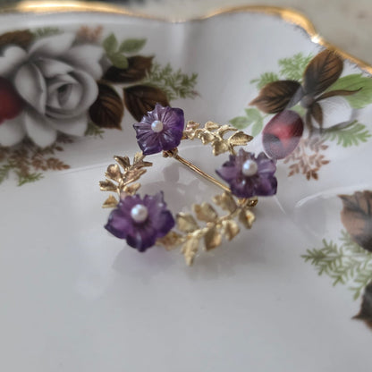 Vintage 14k gouden broche met amethist en parel