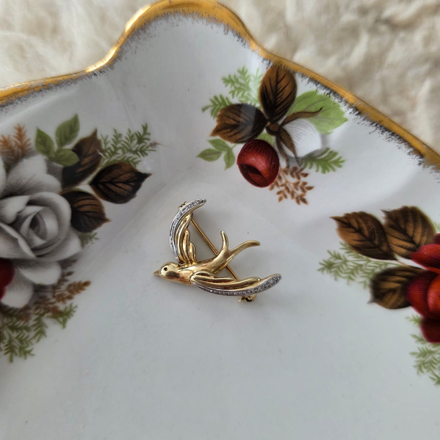 Vintage 14k gouden broche met diamant zwaluw