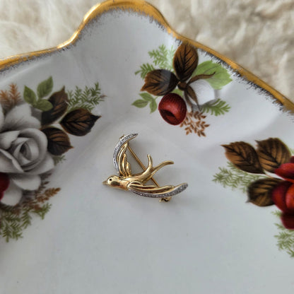Vintage 14k gouden broche met diamant zwaluw