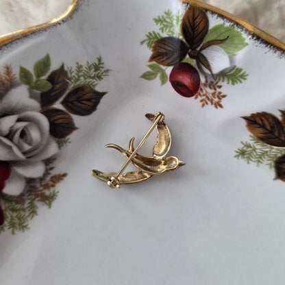 Vintage 14k gouden broche met diamant zwaluw