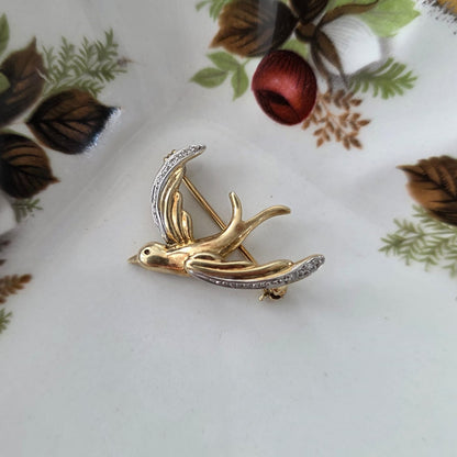 Vintage 14k gouden broche met diamant zwaluw