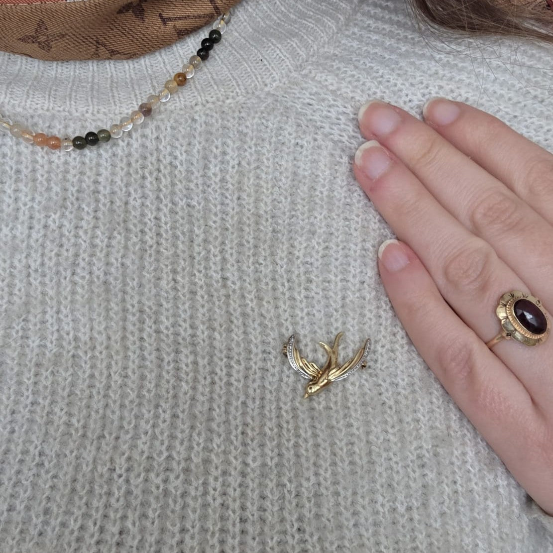 Vintage 14k gouden broche met diamant zwaluw