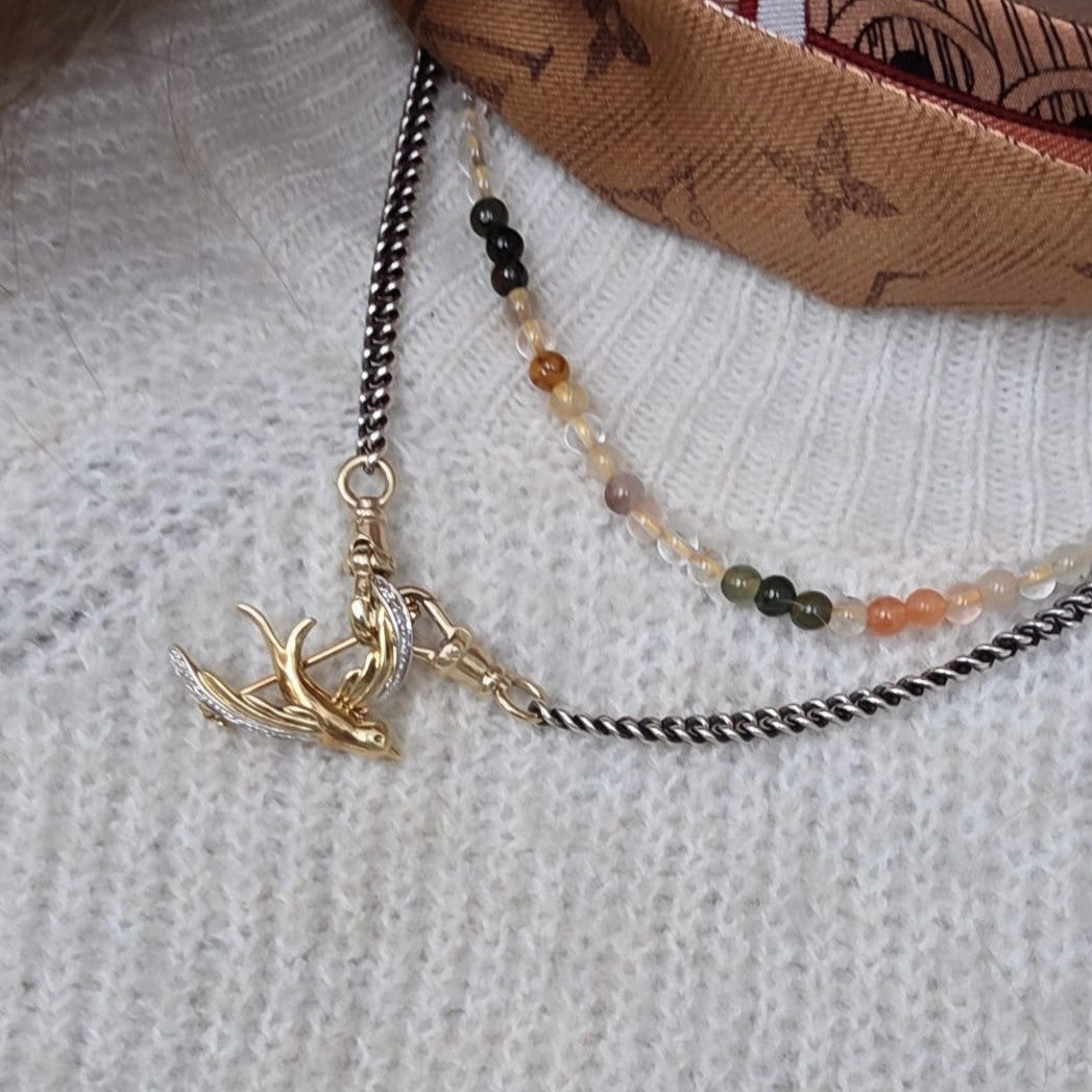 Vintage 14k gouden broche met diamant zwaluw