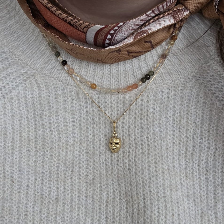 Vintage 18k gouden hanger met diamant masker