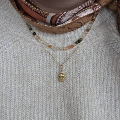 Vintage 18k gouden hanger met diamant masker