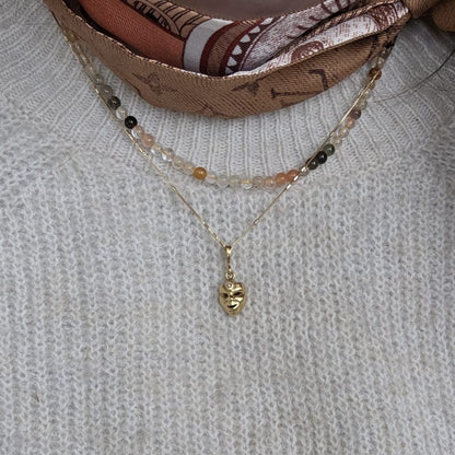 Vintage 18k gouden hanger met diamant masker