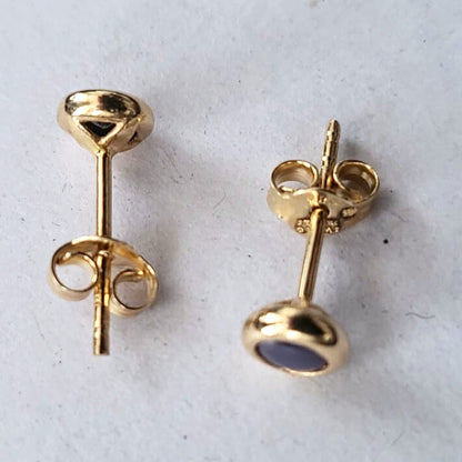 Pre-owned 14k gouden oorbellen paars steentje