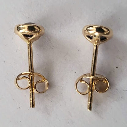 Pre-owned 14k gouden oorbellen paars steentje