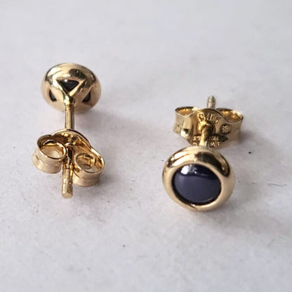 Pre-owned 14k gouden oorbellen paars steentje