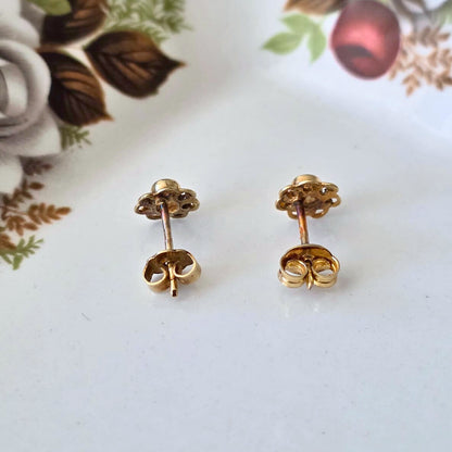 Vintage 14k gouden oorstekers bloedkoraal