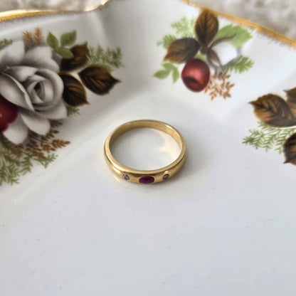 Vintage 18k gouden ring met robijn en diamant
