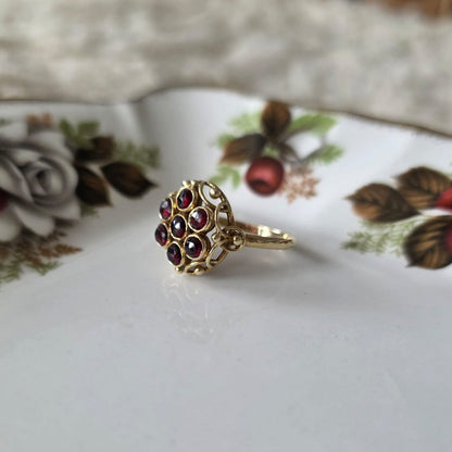 Vintage 14k gouden ring met granaat entourage