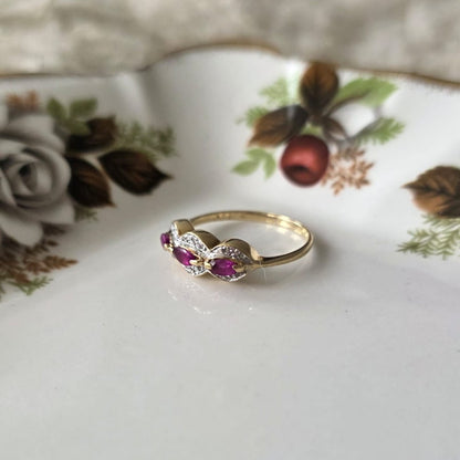 Vintage 14k gouden ring met robijnen en diamanten