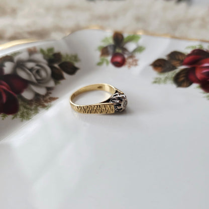 Vintage 18k gouden verlovingsring met diamant bark finish