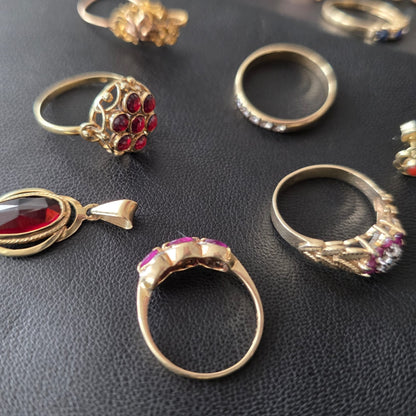 Vintage 14k gouden ring met granaat entourage