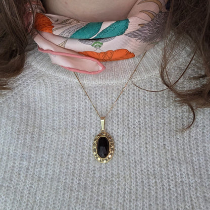 Vintage 14k gold pendant with garnet