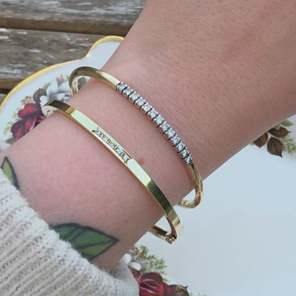 Vintage 14k gouden bangle armband met 13 diamanten