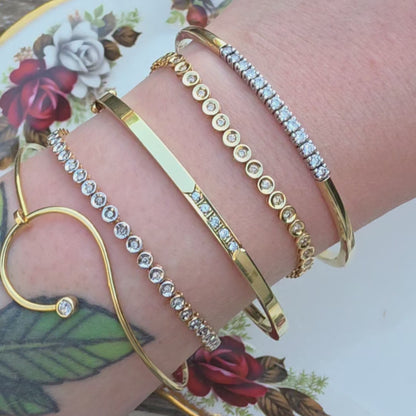 Vintage 14k gouden bangle armband met 13 diamanten