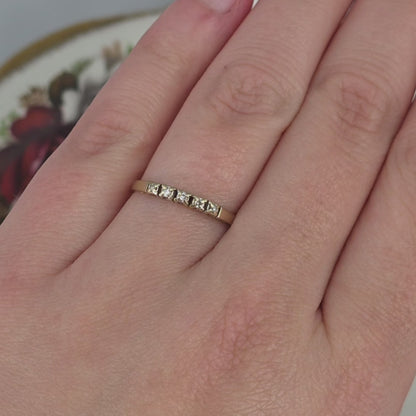 Vintage 14k gold ring with a row of diamonds