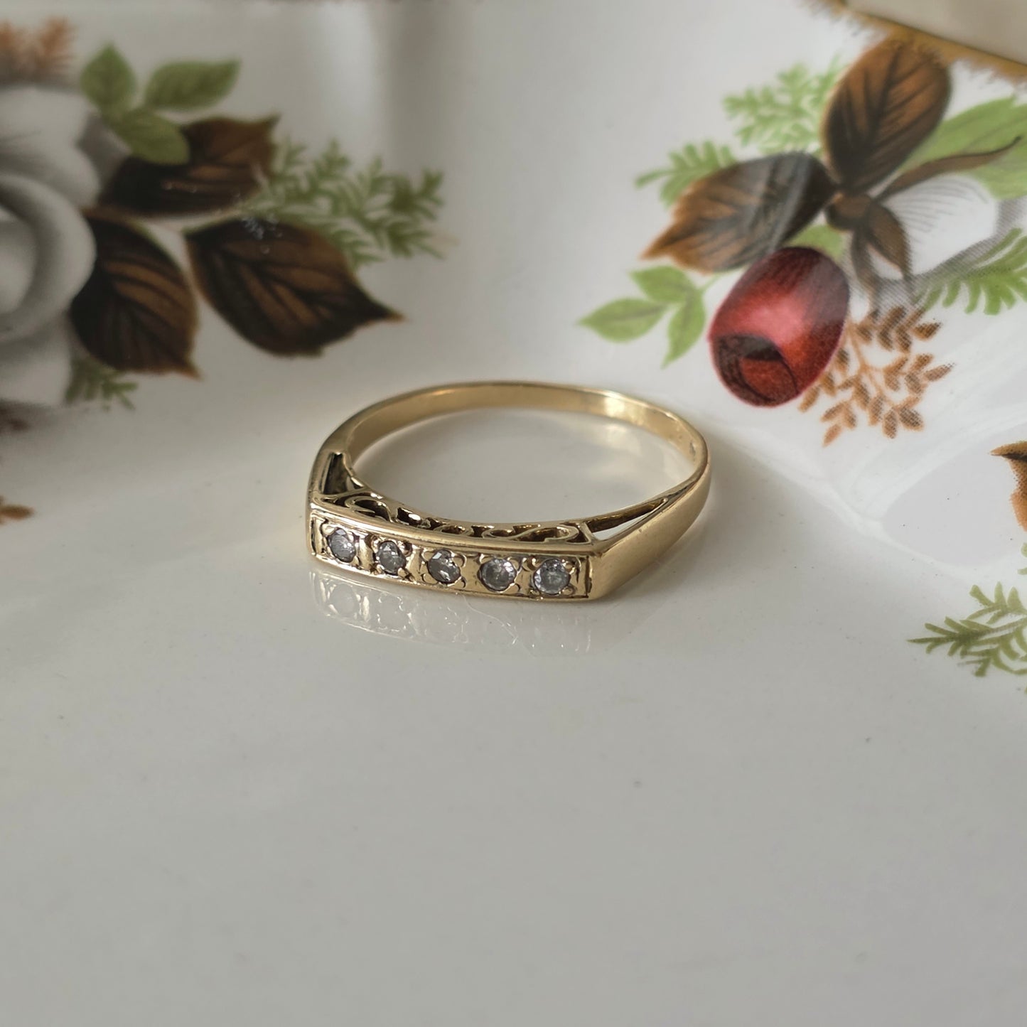 Vintage 14k gouden ring met diamanten en krullen
