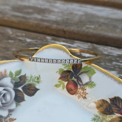 Vintage 14k gouden bangle armband met 13 diamanten