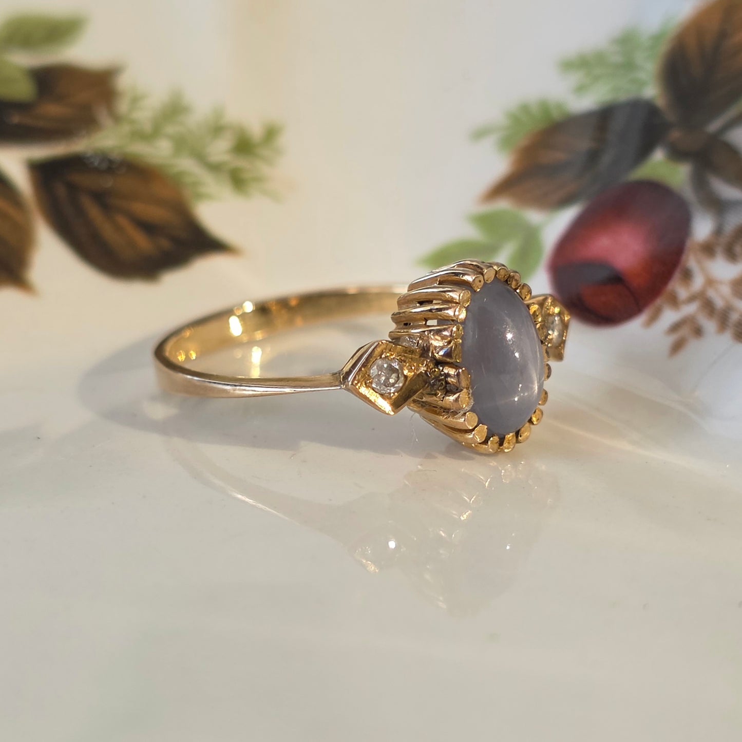 Vintage 14k gouden ring met ster saffier en diamanten