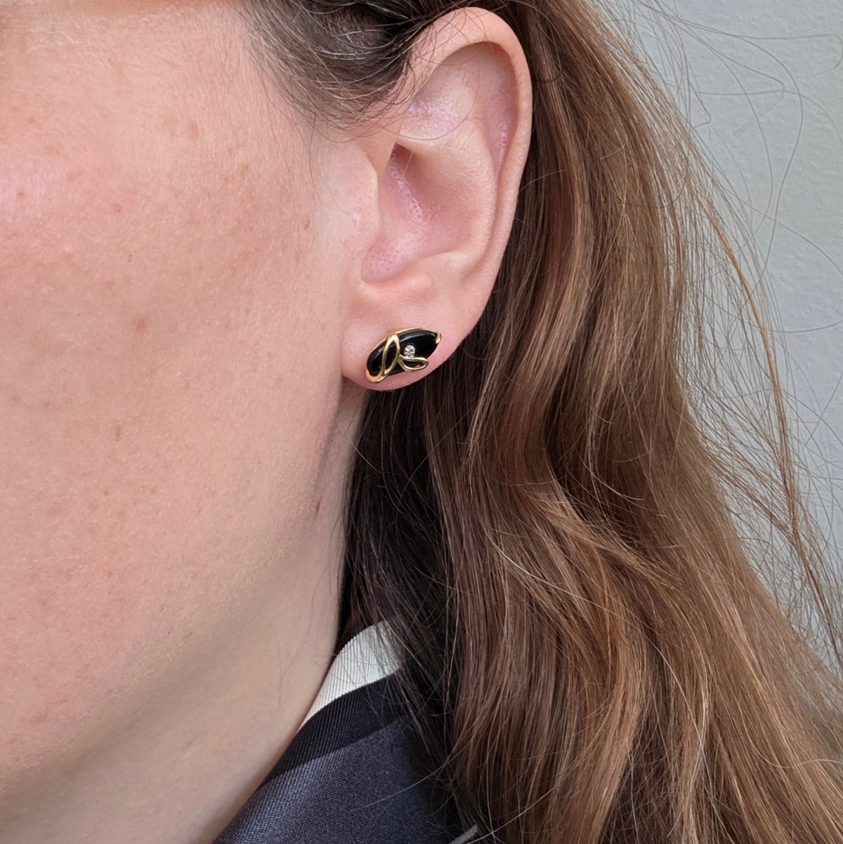Vintage 14k gouden oorstekers met onyx en diamant