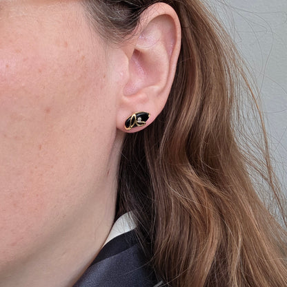 Vintage 14k gouden oorstekers met onyx en diamant