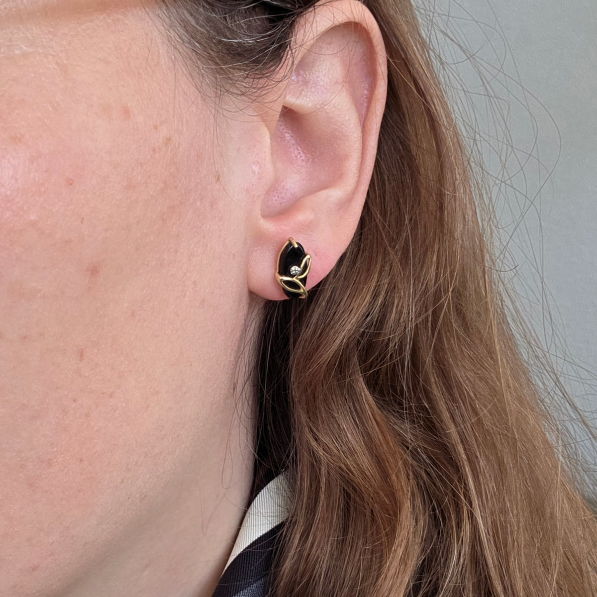 Vintage 14k gouden oorstekers met onyx en diamant