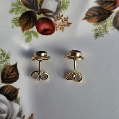 Vintage 14k gouden oorstekers groene spinel